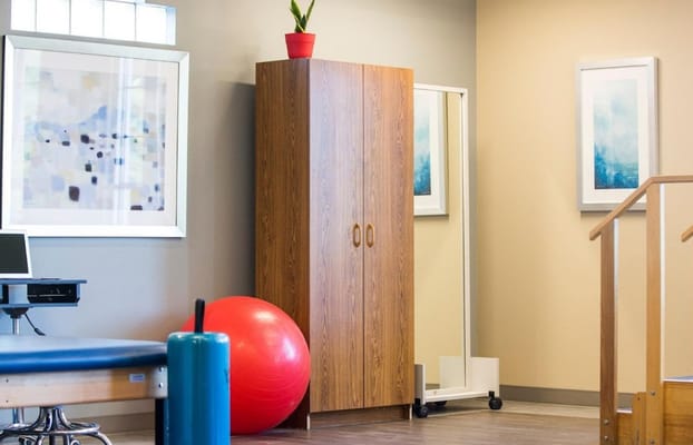 Interior room with furniture and exercise equipment
