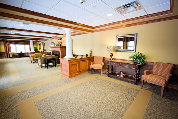 Spacious common area with seating and decorative elements