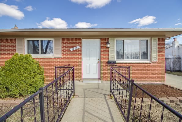 Front entrance with steps and railings at Stratford House