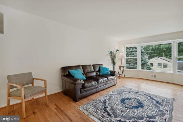 Cozy living room with sofa and a view of the outdoors