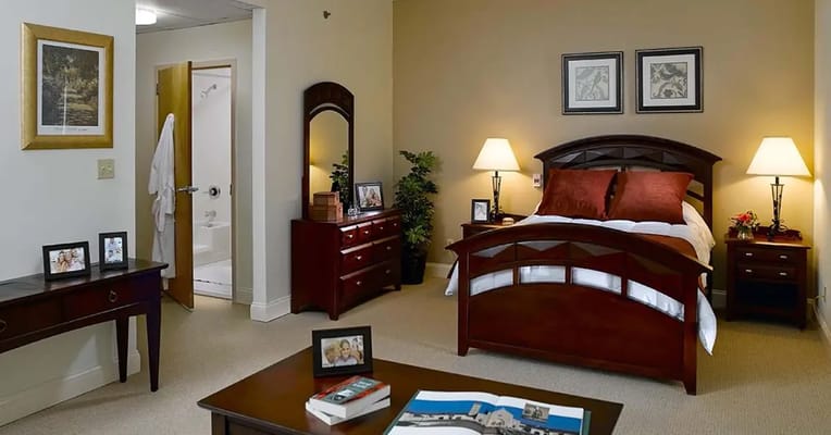 A well-furnished private resident room with decor