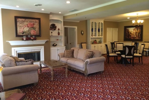 Cozy lounge area with sofas and dining table