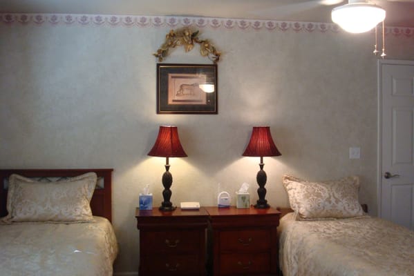 Interior view of a shared resident room with two beds