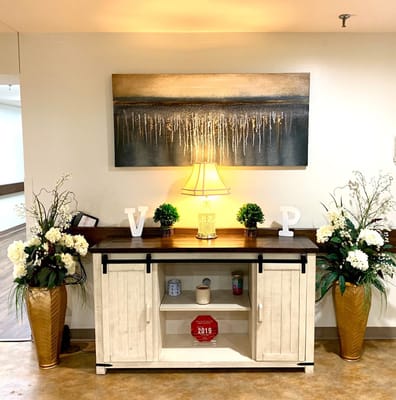 Decorative interior space with plants and art