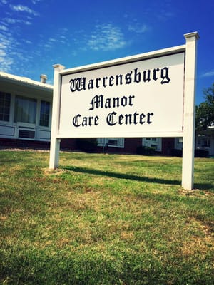 Sign of Warrensburg Manor Care Center in front of the building