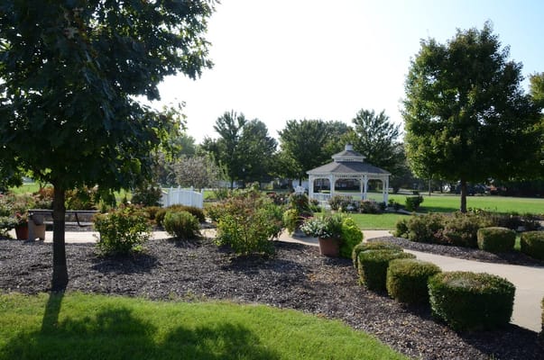 A beautiful outdoor garden area with a gazebo