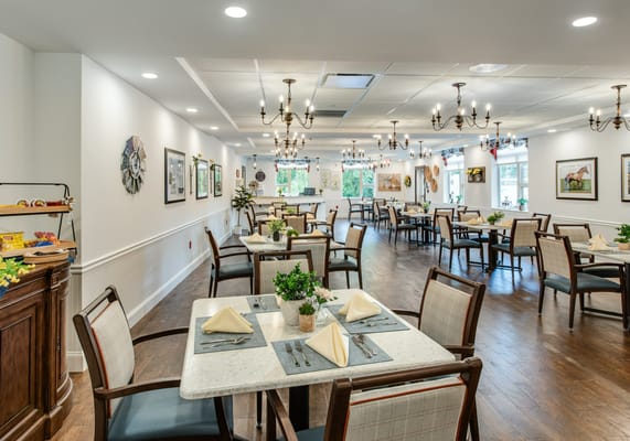 Dining area with tables set for meals