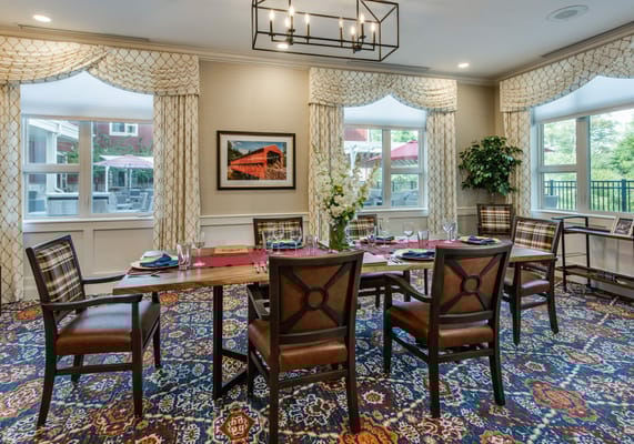Elegant dining room setup with floral centerpiece
