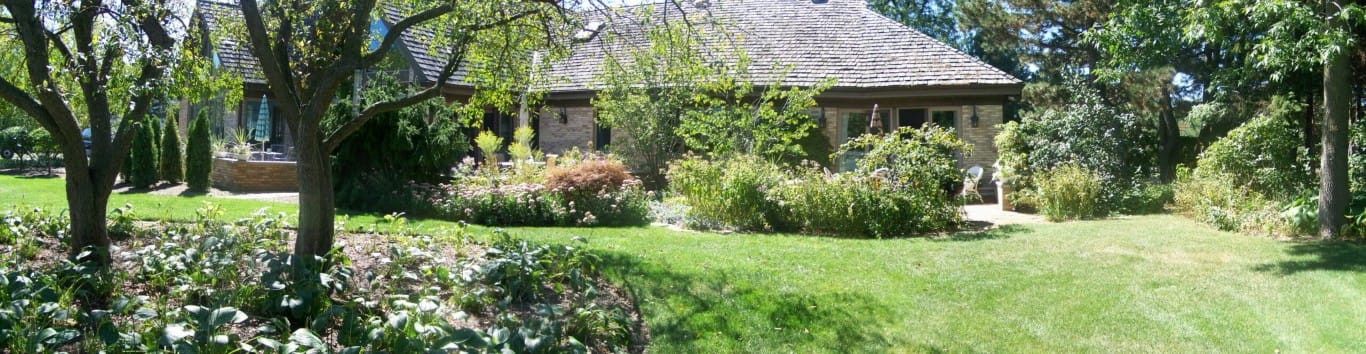 View of the garden and exterior of Theresa's Home Care I, LLC
