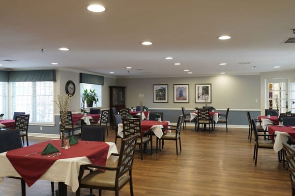 Interior dining area with tables set for meals