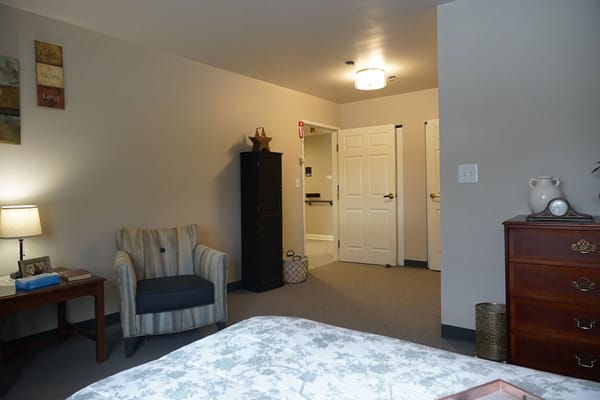 Interior view of a resident's room with furniture