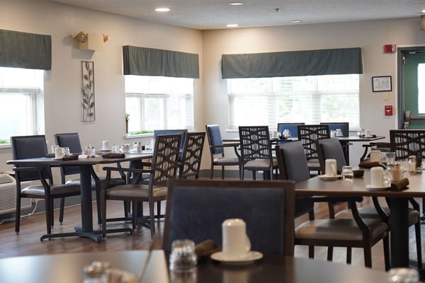Dining area with tables set for meals