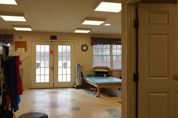 Interior view of a therapy room with equipment