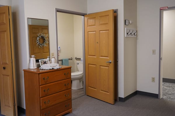 Interior view of a resident's room with furniture