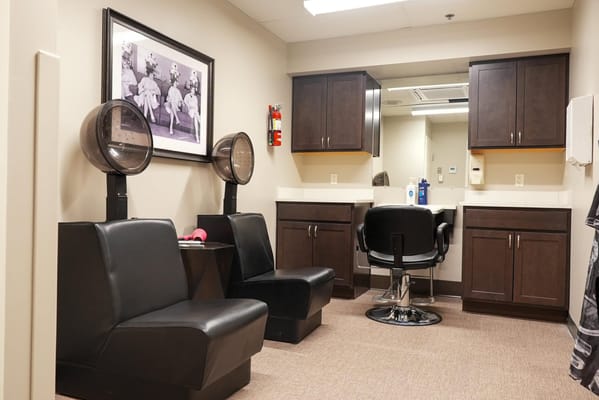 Interior view of a salon area with styling chairs