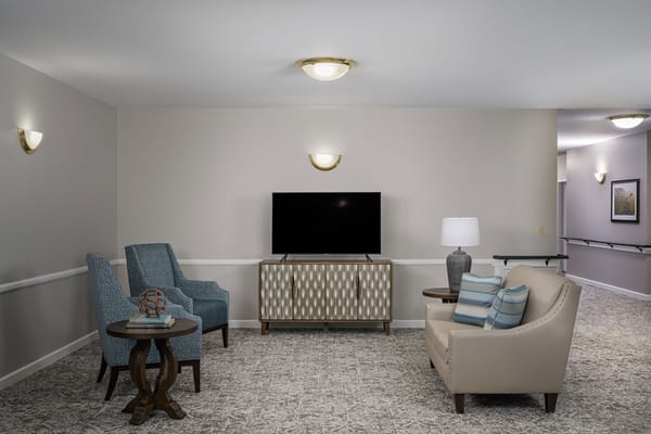 Interior common area with seating and television