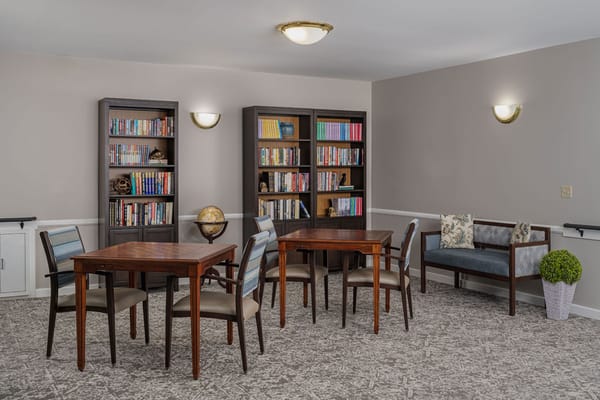 Common area with bookshelves and seating