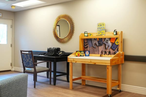 An activity space with a workbench and vintage typewriter