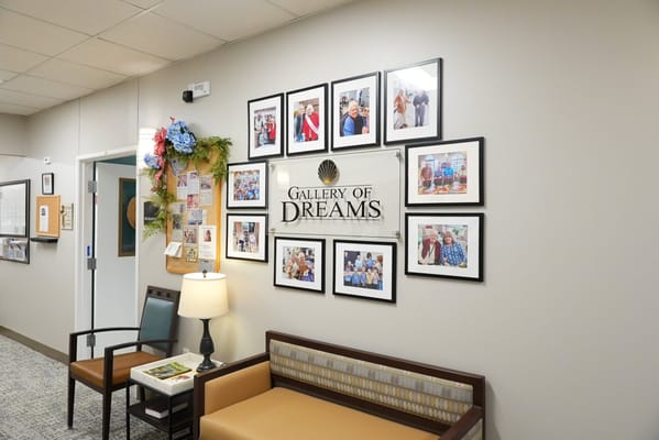 Interior common area with a gallery of resident photos