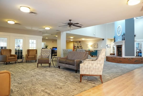 Common area with seating and a fireplace