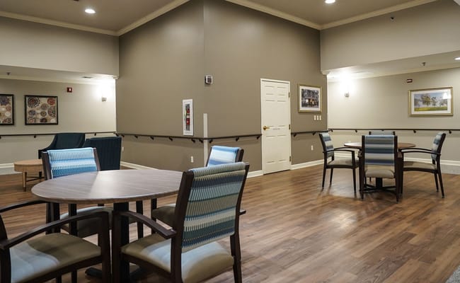 Common area with seating and tables in a lobby