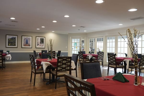 Dining room with tables set for residents