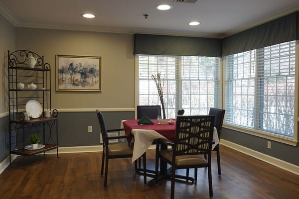 Interior view of a dining area with table and chairs