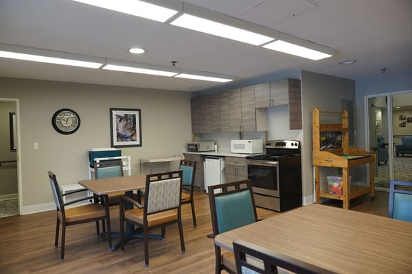 Interior view of a communal kitchen and dining area