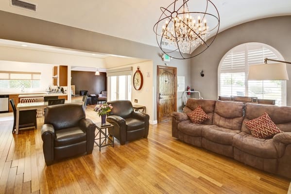 Cozy living room with seating and chandelier