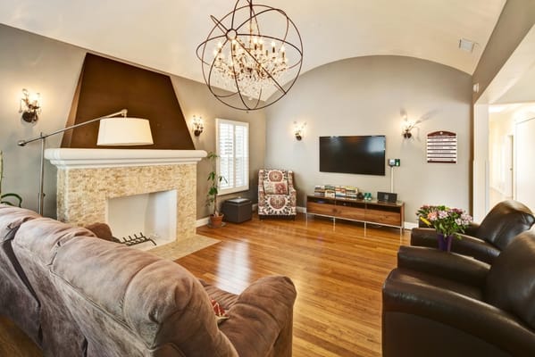Spacious living room with a fireplace and seating area