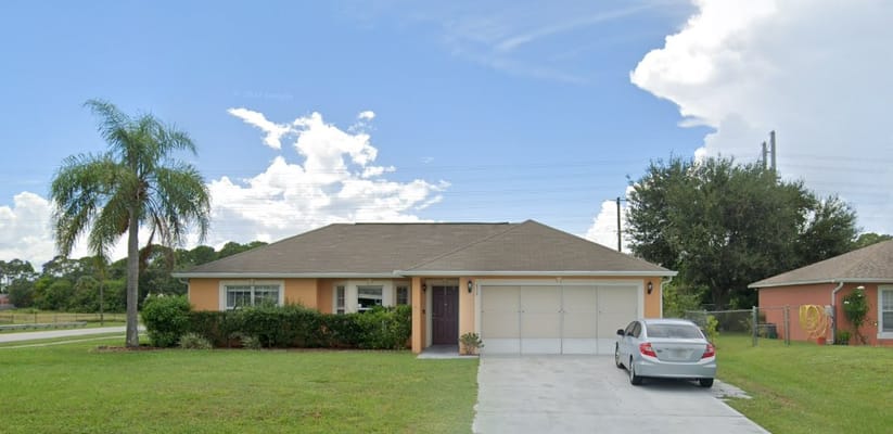Exterior view of a single-family home with a driveway