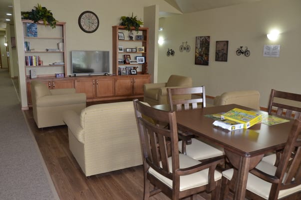 Common area with seating and a television