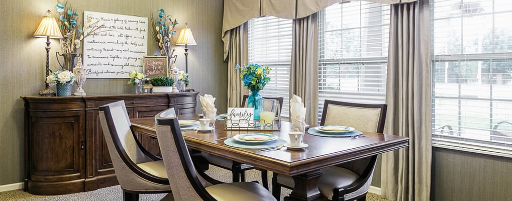 Bright dining room with wooden table and chairs