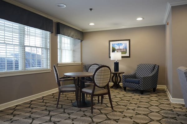 Cozy common area with seating and table