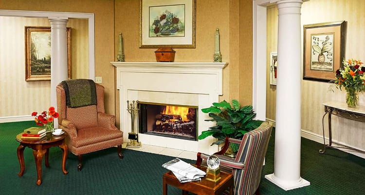 Cozy common area with a fireplace and seating