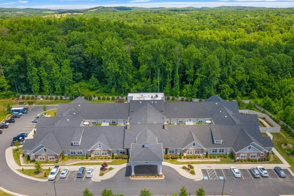 Aerial view of the Poet's Walk Warrenton facility surrounded by trees