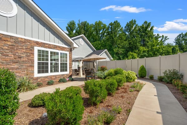 Well-maintained garden area with seating