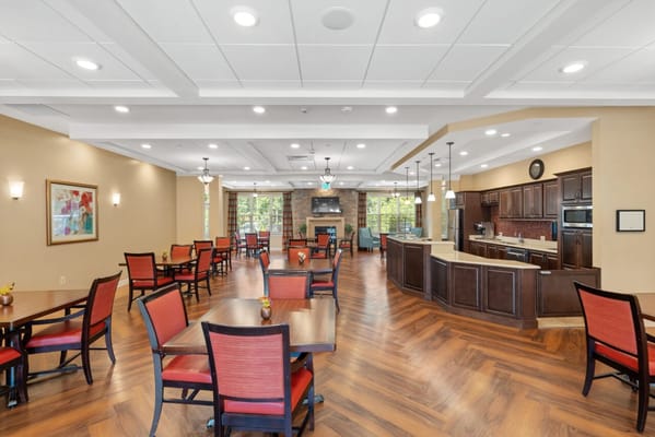 Bright dining area with tables and chairs