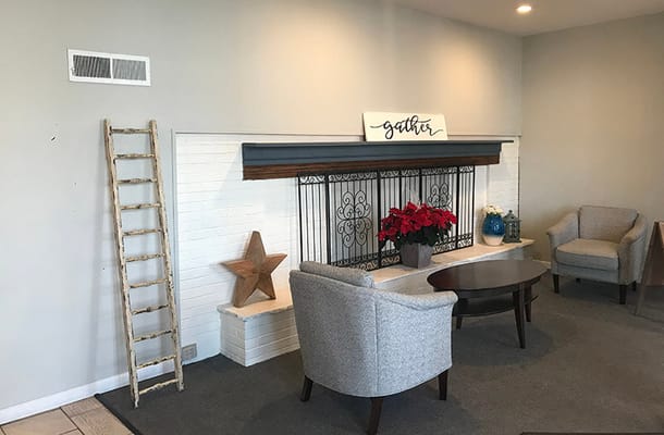 Common area with seating and decorative accents