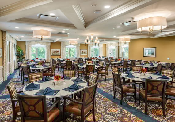 Dining room with tables set for meals
