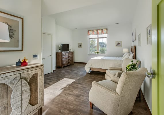 Spacious and well-lit resident bedroom