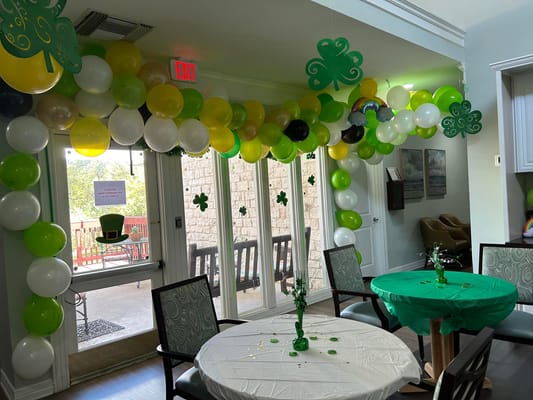 Decorated common area with balloons for a celebration