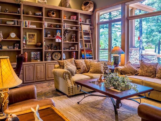 Cozy living room with comfortable seating and large windows