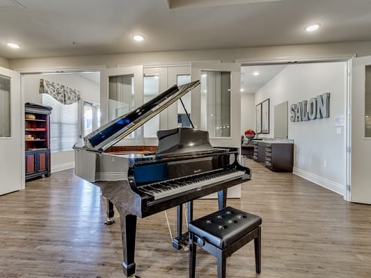 Piano in a salon area of the facility