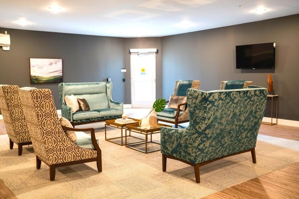 Cozy lounge area with seating and a coffee table