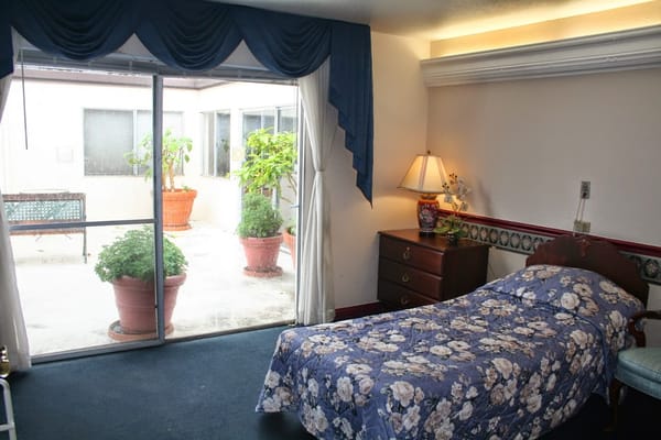 Interior view of a resident room with outdoor access