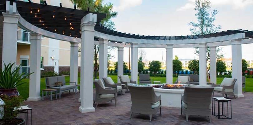 A beautiful outdoor seating area with a fire pit