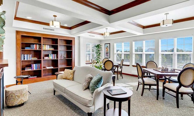 Comfortable living room with bookshelves and seating
