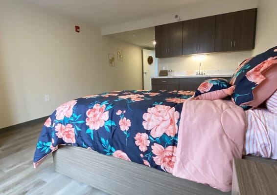 Cozy private bedroom with floral bedding