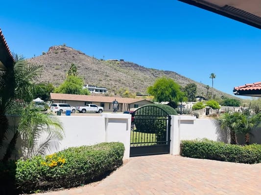 Outdoor view of the facility with a mountain backdrop